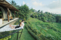 Emerald green rice terraces of Sidemen Bali with soft airy highlights and filmic texture