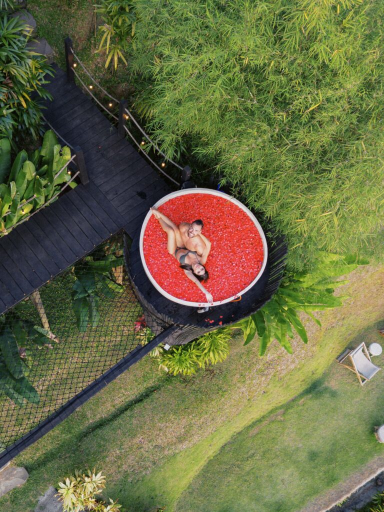 Professional drone photography of a couple in Bali rice terraces.
