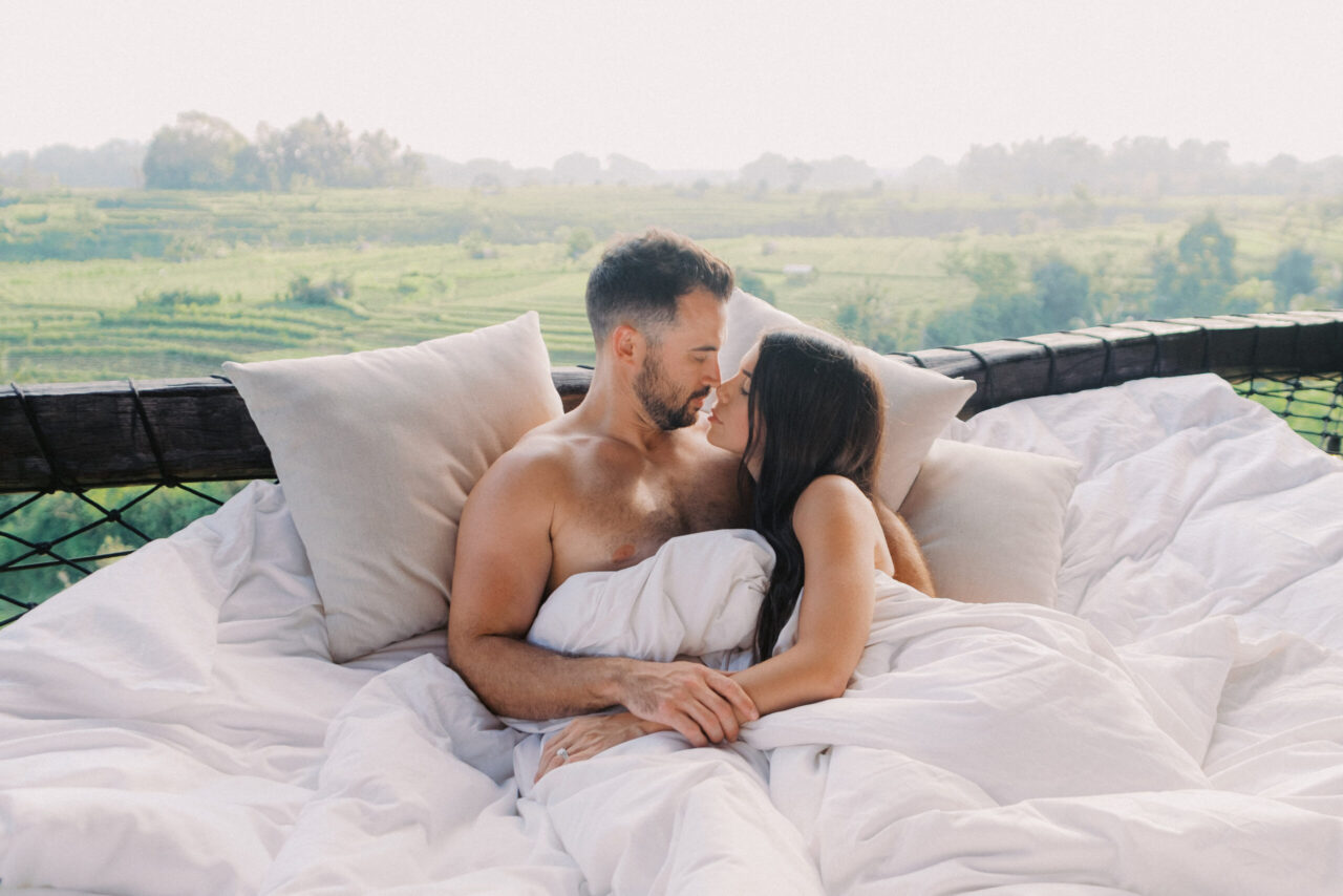 Couple enjoying a romantic getaway at Camaya Bali bamboo house.