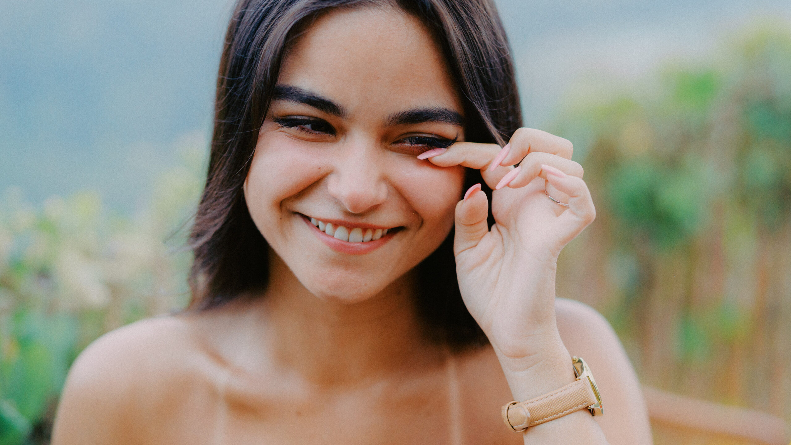 Nicholas kneeling for a surprise proposal at Avana Bamboo Bali with lush jungle background